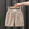 Mini Fashion™ - Mukavaa collegea - Lasten shortsit