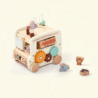 Thumbnail for BusyRide – Koulutus ja monipuolisuus – Puinen Montessori-aktiviteettibussi