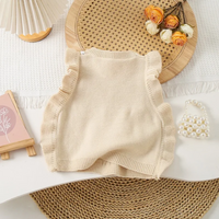 Thumbnail for LittlePetal – Suloinen ja mukava – hihaton tyttöjen neuletakki, jossa on kukkakuvio