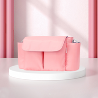 Thumbnail for ToddlerOrganizer – Vettä hylkivä ja tilava – lastenvaunujen järjestelijä pullotelineillä